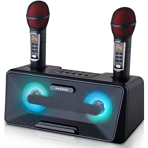 Karaoke machine with two microphones and colorful lights on a white background