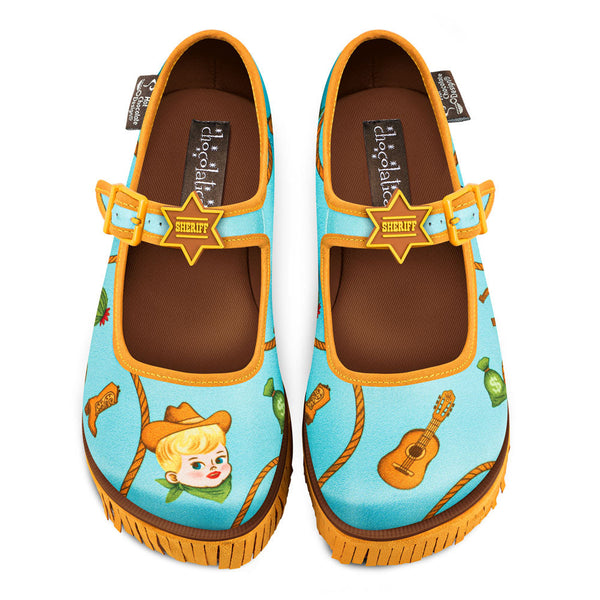 Children's shoes with cowboy design and 'Sheriff' buckle on a white background