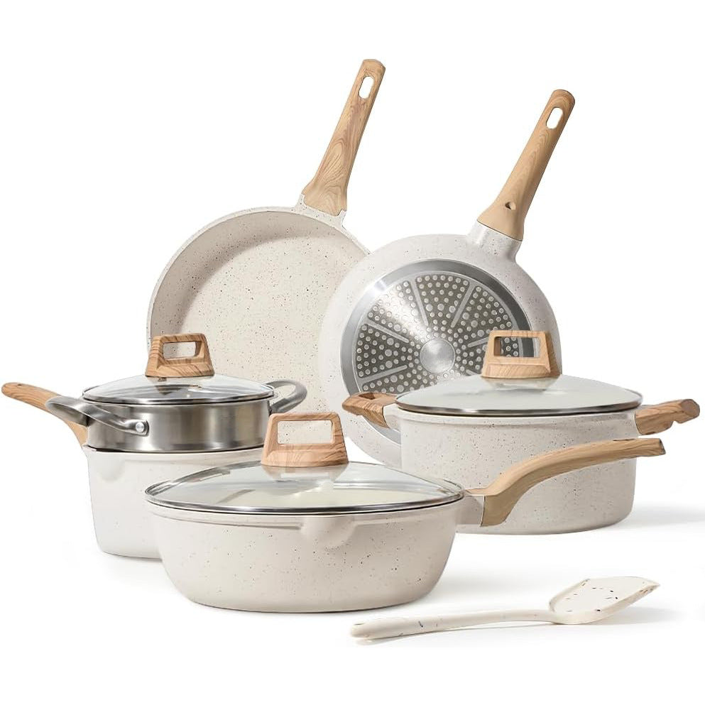 Set of ceramic cookware with wooden handles on a white background