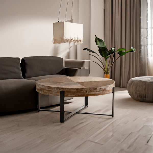 Modern living room with a brown sofa, wooden coffee table, and decorative plant.
