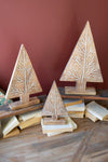 SET OF THREE CARVED WOODN CHRISTMAS TREES ON STANDS