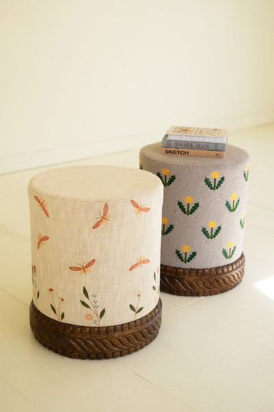 UPHOLSTERED OTTOMAN WITH CARVED WOOD BASE - GREY