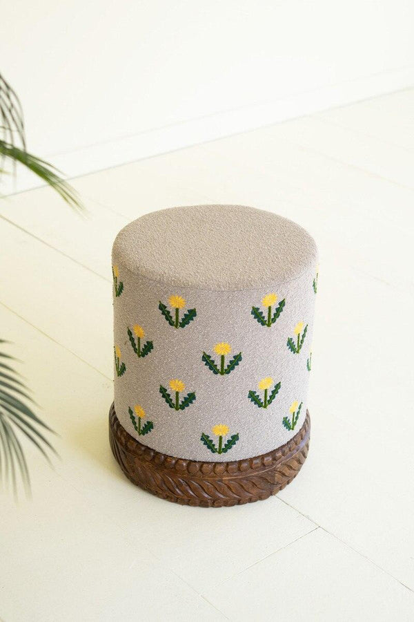 UPHOLSTERED OTTOMAN WITH CARVED WOOD BASE - GREY