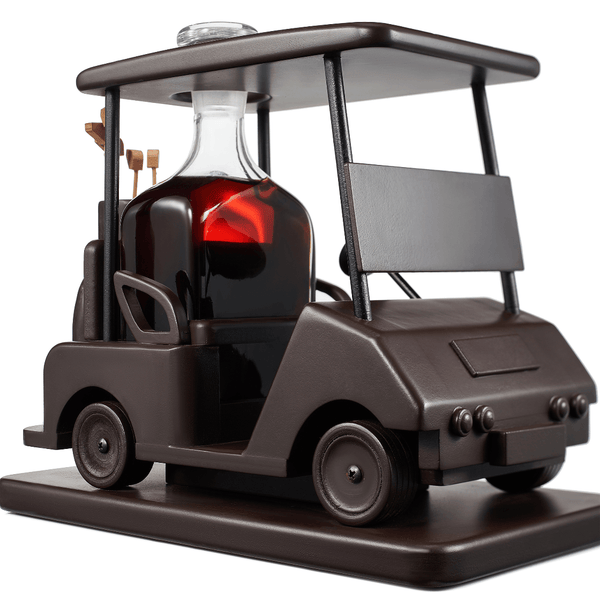 Golf cart-shaped decanter with red liquid inside on a white background