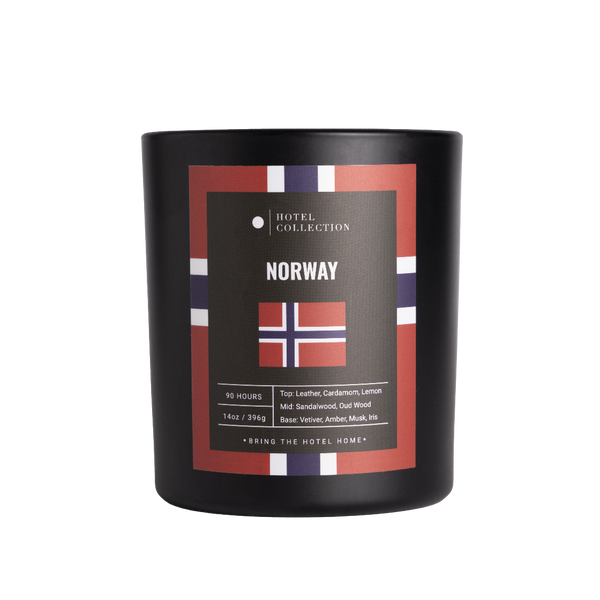 Black candle with Norway-themed label on a white background