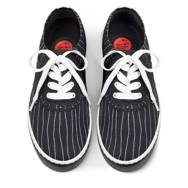 Dark Chocolate Design Sneakers Black pinstripe shoes with white laces on a white background