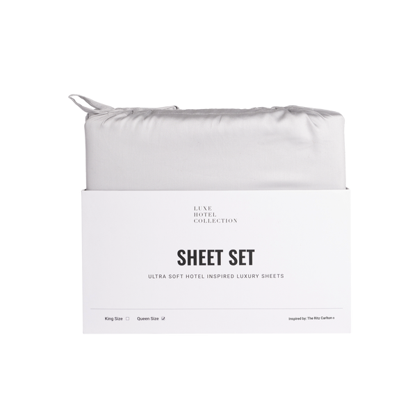 White sheet set packaging with 'Leve Hotel Collection' branding on a white background