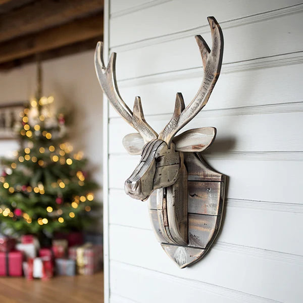 Recycled Wood Carved Wall Mounted Deer Head on a wall with a Christmas tree in the background