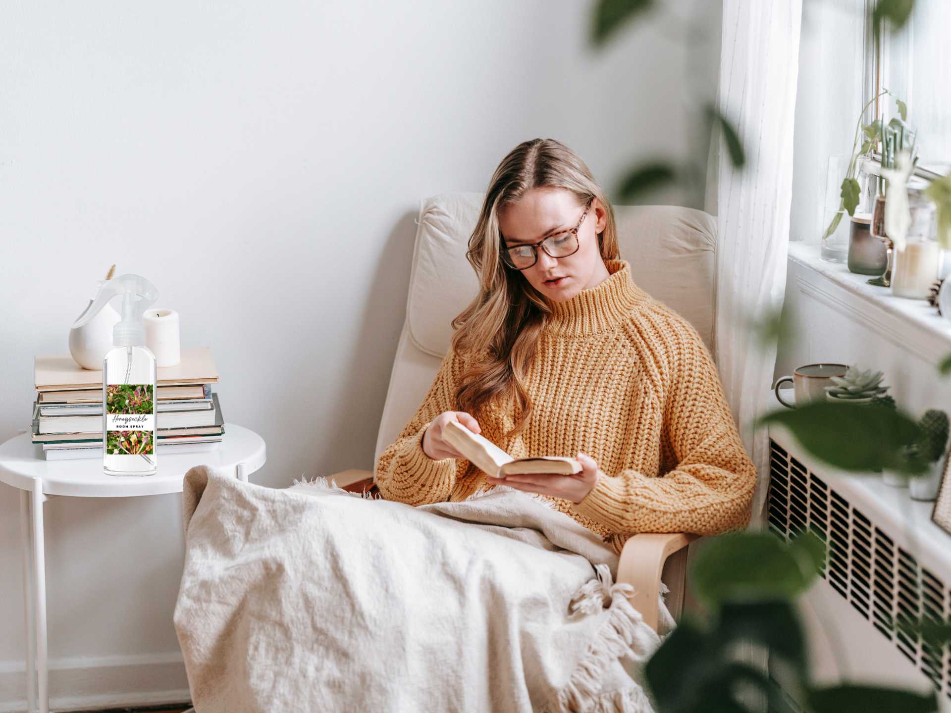 Woman reading a book in a cozy living room