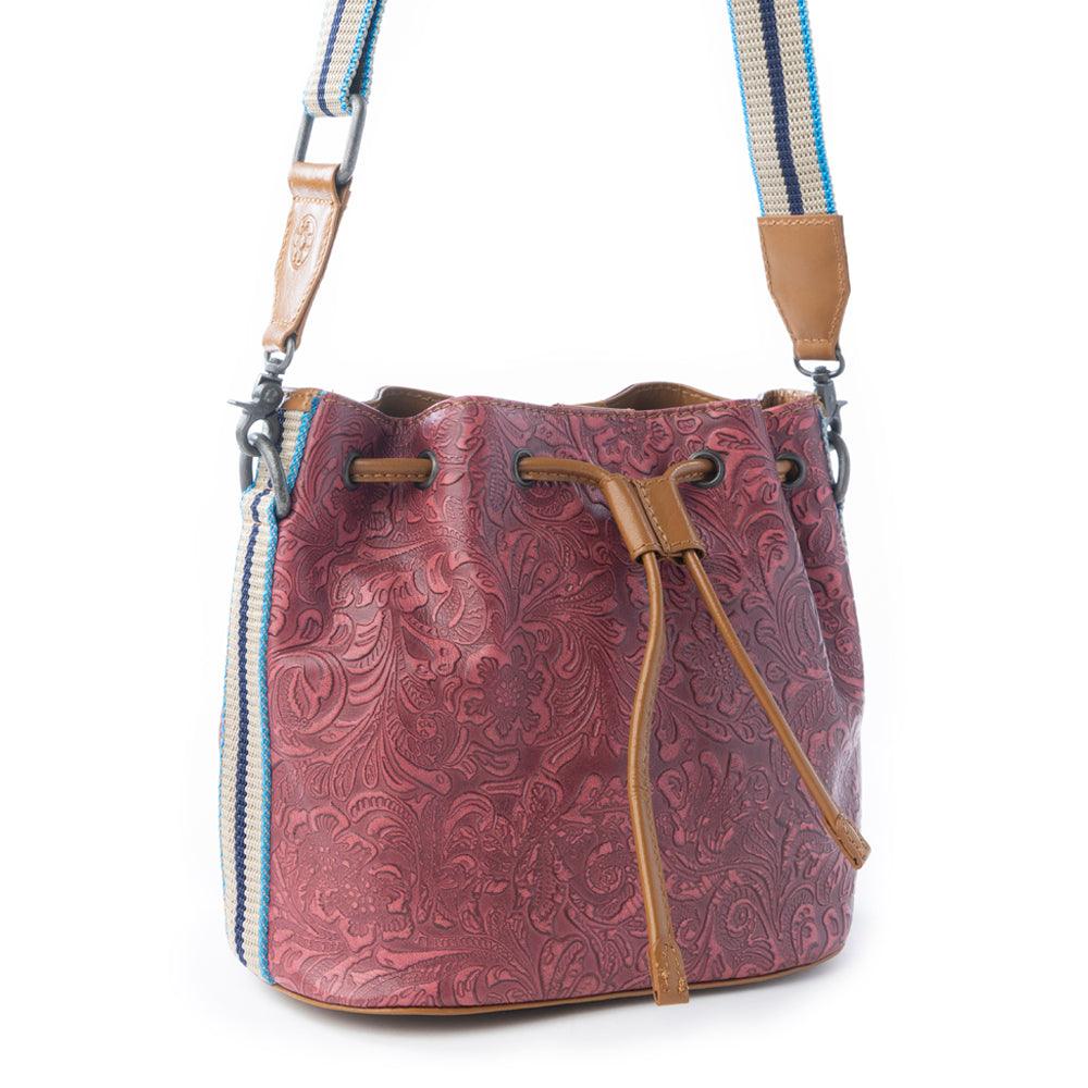 Myra Emberlace Embossed Leather Bucket Bag in Berry Rouge
