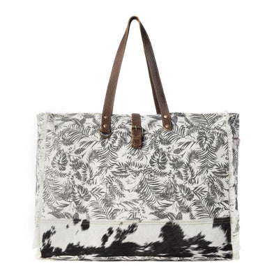 Myra Wildfern Hide Western Weekender Bag for Women in ivory with hairon detail