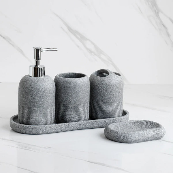 Grey 5Pcs Bathroom Accessories set by Buddify featuring soap dispenser, tumbler, toothbrush holder, and soap dish on tray for sleek bathrooms.
