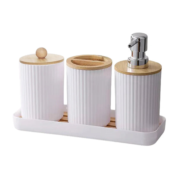 Buddify white bathroom accessories set with bamboo lids, featuring soap dispenser, toothbrush holder, and cotton jar on matching tray.