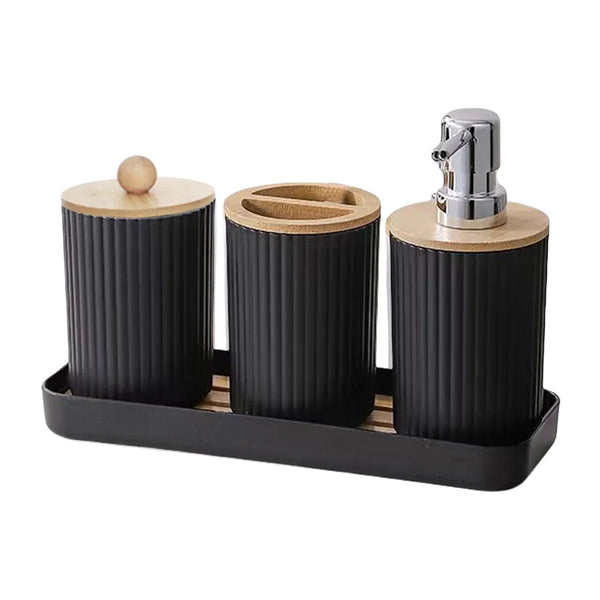 Complete Buddify black bathroom accessories set with soap dispenser, toothbrush holder, and cotton jar on tray with bamboo lids.