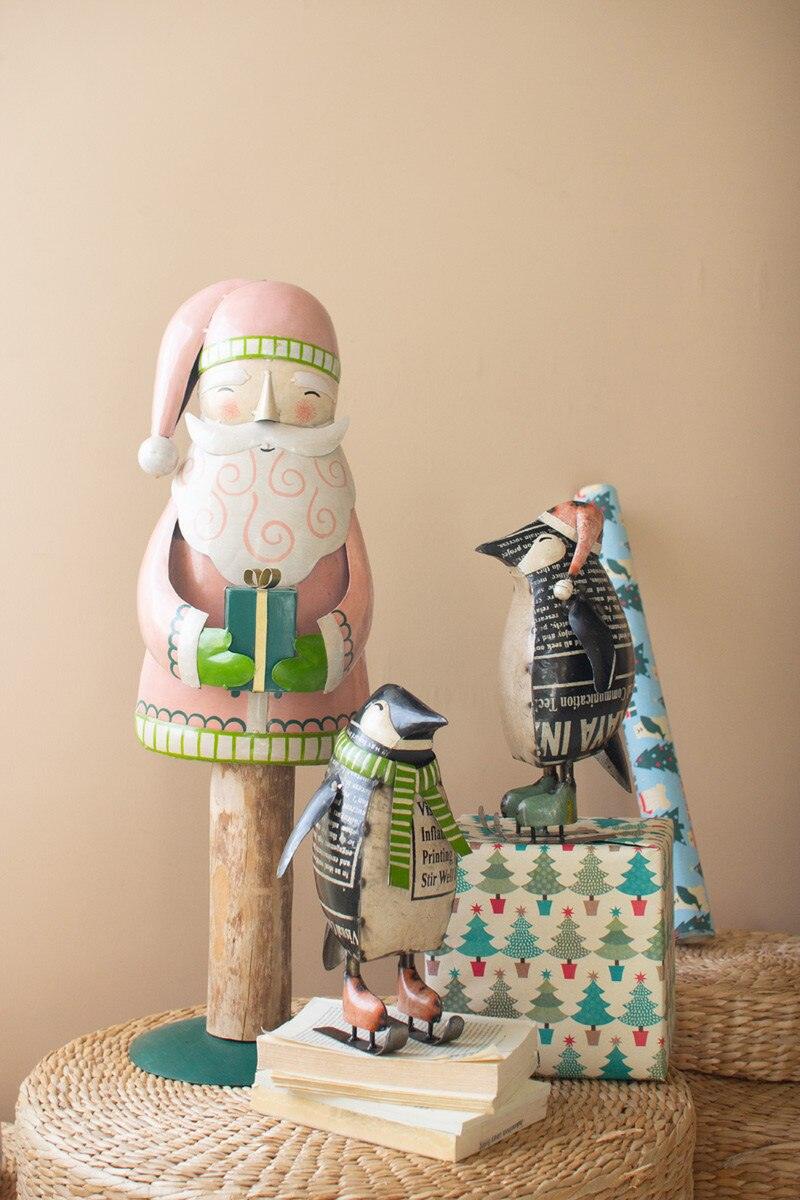 SET OF TWO RECYCLED METAL SKATING CHRISTMAS PENQUINS