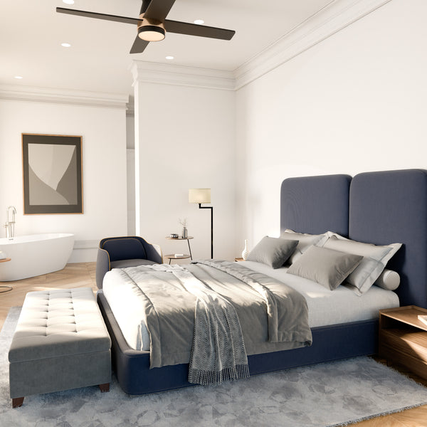 Santa Ana 52″ Ceiling Fan | Matte Black Aged Brass w – Matte black blades Modern bedroom with a blue bed, gray rug, and white walls.