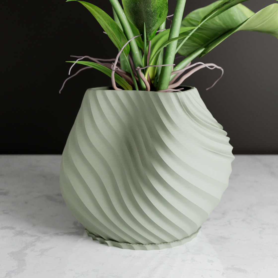 Green textured planter with a plant on a marble surface