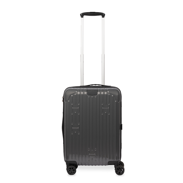Black suitcase with wheels and handle on a white background