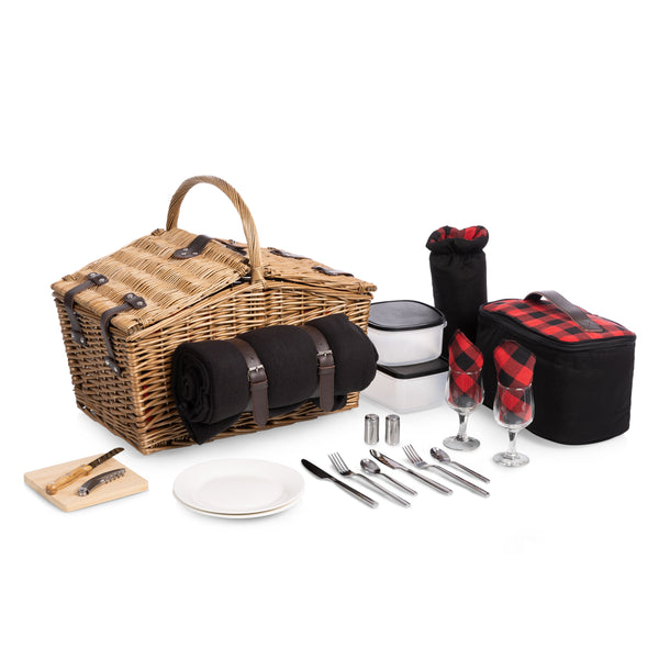 Picnic basket set with cutlery, plates, and glasses on a white background