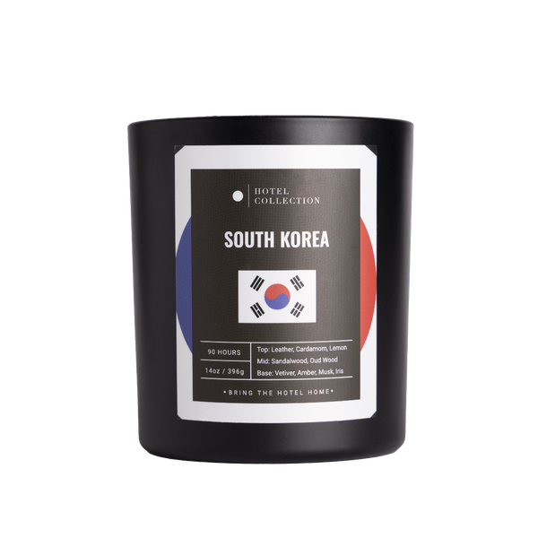 Black candle with South Korea label on a white background