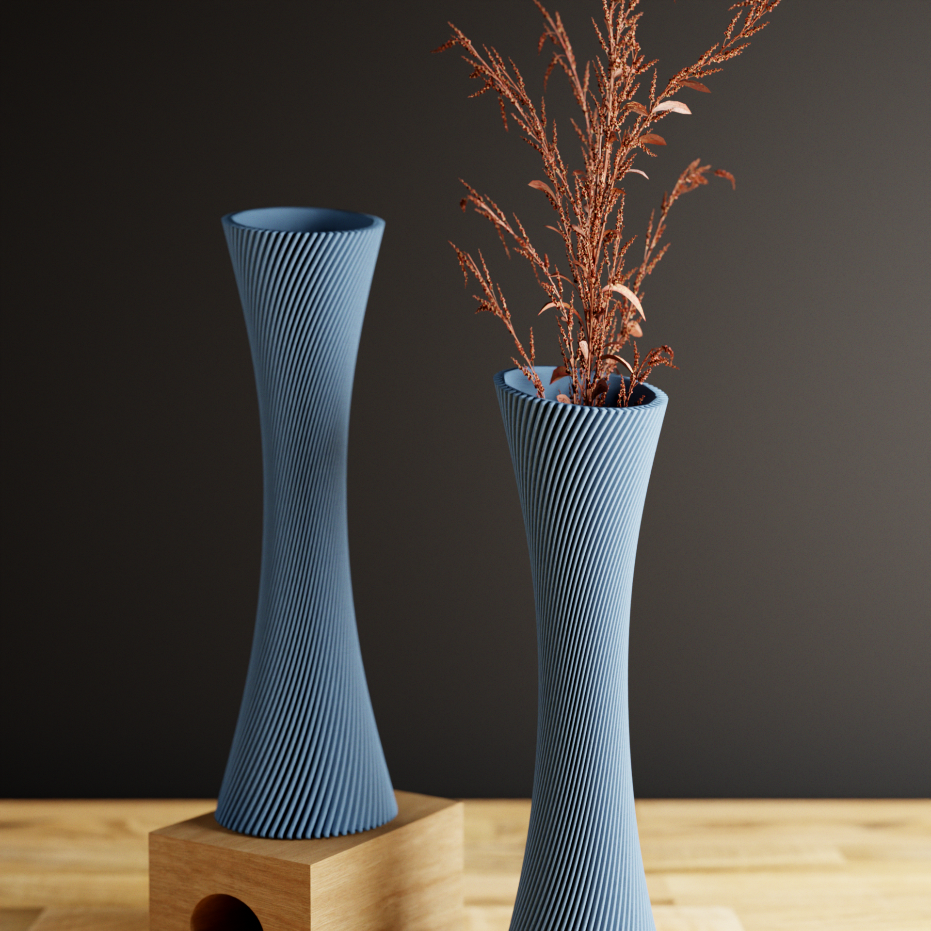 Two blue textured vases on a wooden surface with a dark background