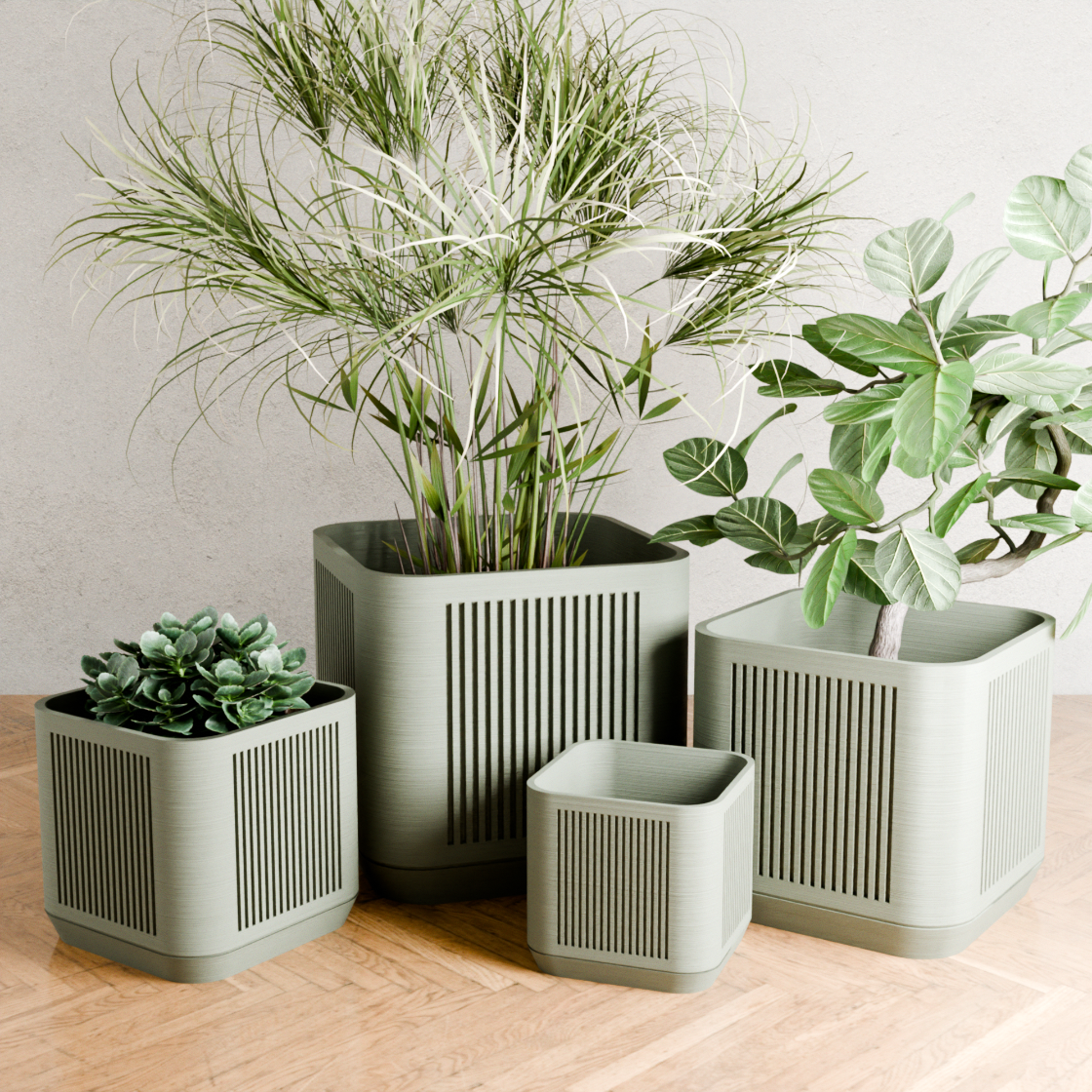 Set of green planters with plants on a wooden surface