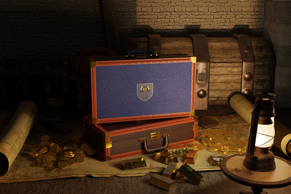 Vintage suitcase with gold coins and a lantern on a stone floor
