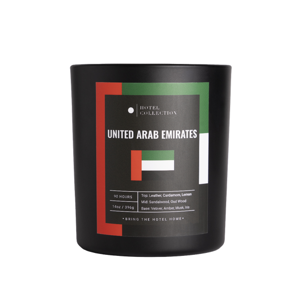 Black candle with United Arab Emirates flag design on a white background