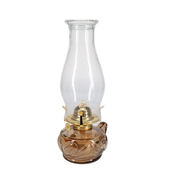 Vintage-style oil lamp with clear glass chimney and brown base on a white background