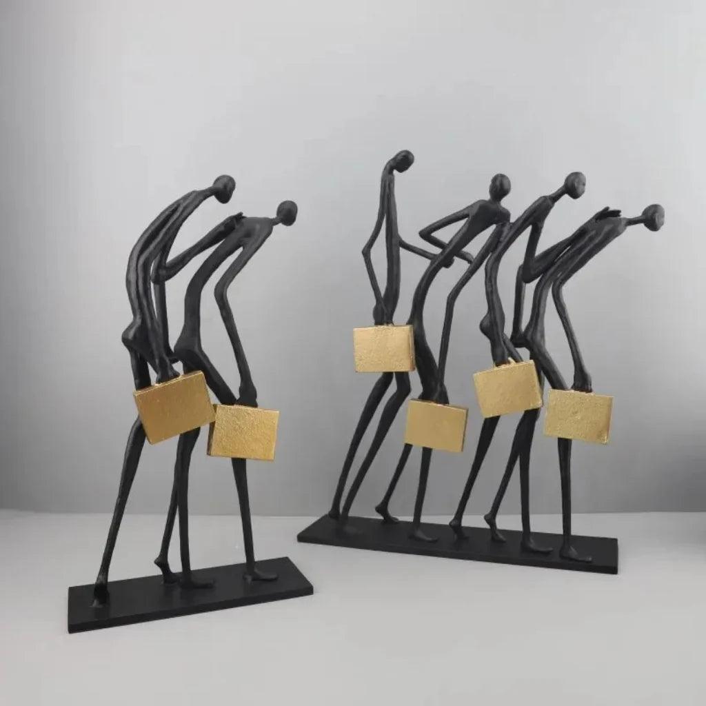 Walking Figures Sculpture with Gold Briefcases