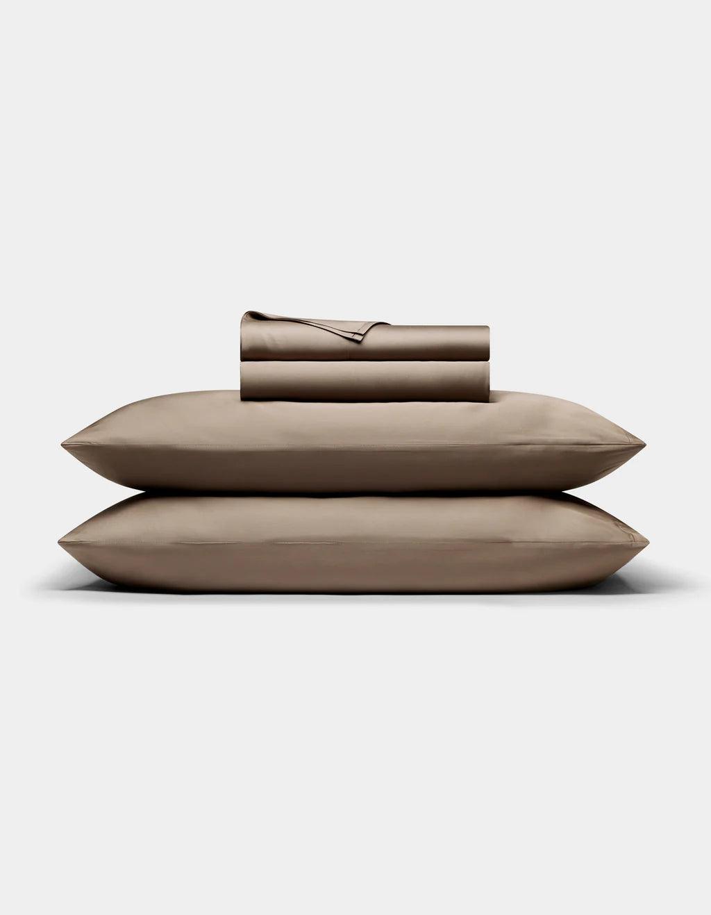 Walnut -  bed sheets and pillows on a white background