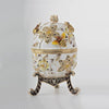 White Faberge Egg with Bees and Flowers