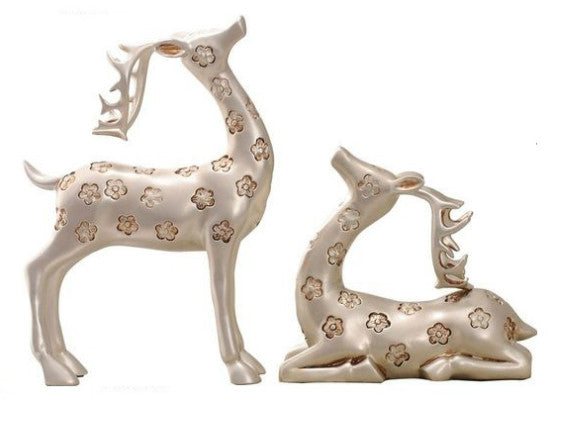 Elegant Pair of Silver Gazing Deer Sculptures with Antlers