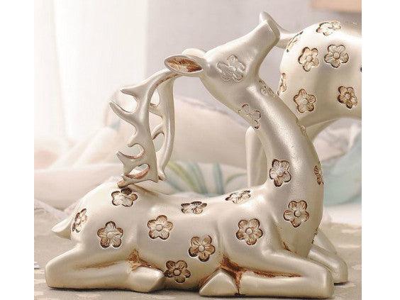 Elegant Pair of Silver Gazing Deer Sculptures with Antlers