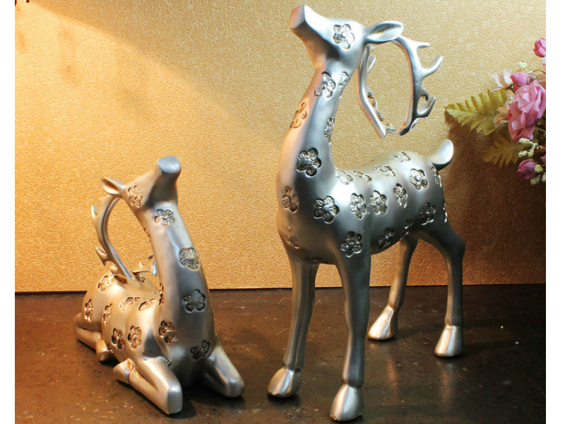 Elegant Pair of Silver Gazing Deer Sculptures with Antlers