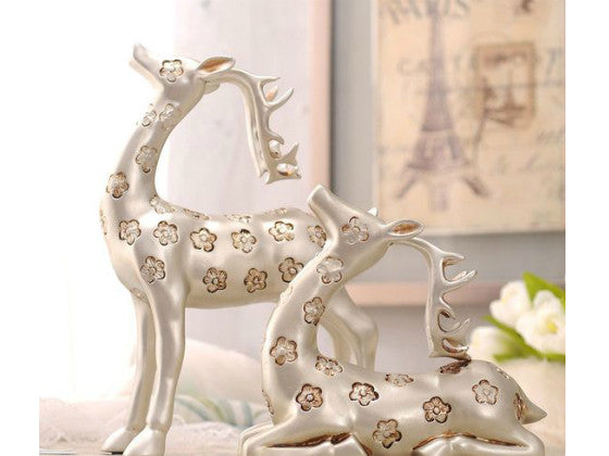 Elegant Pair of Silver Gazing Deer Sculptures with Antlers