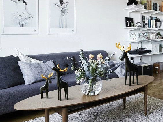 Family of Three Black Reindeer Sculptures with Golden Antlers