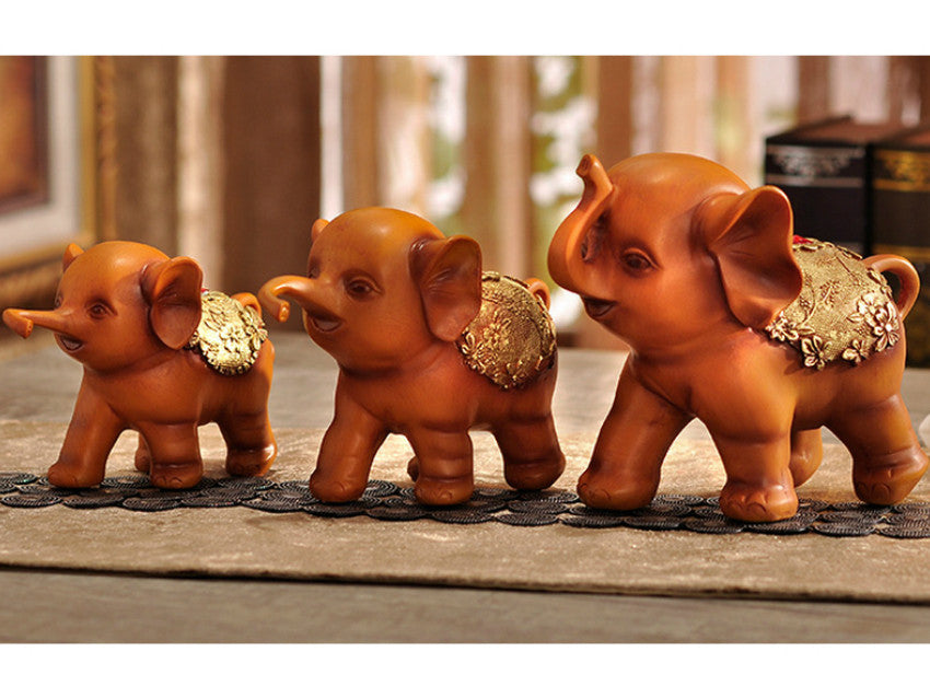 Family of Three Little Elephant Sculptures - Brown