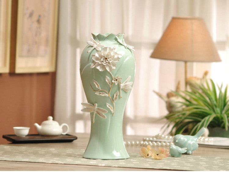 Aqua Green Porcelain Vase with Pinched White Flowers – Elegant Floral Decorative Piece