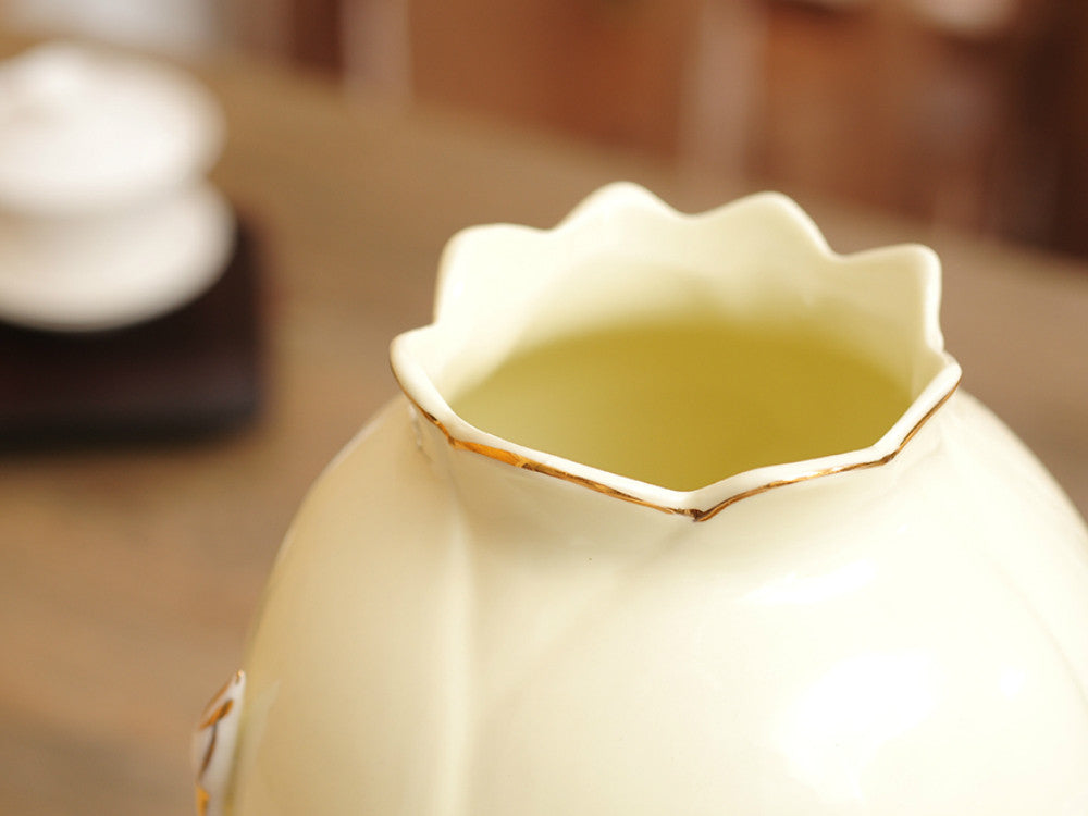 Off-White Porcelain Vase with Pinched Golden stem and White Flowers