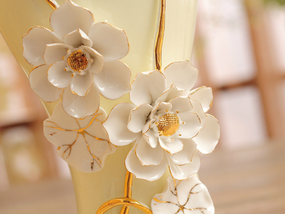 Off-White Porcelain Vase with Pinched Golden stem and White Flowers