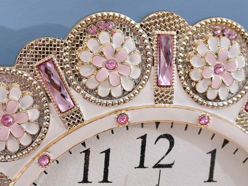 Metallic Gold Clock with Pendulum adorned with Pink Stone Accents