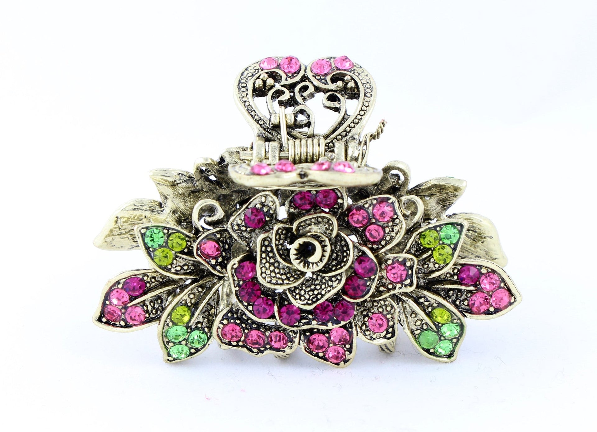 Antique bronze finish hair claw clip on a rose with pink stone petals