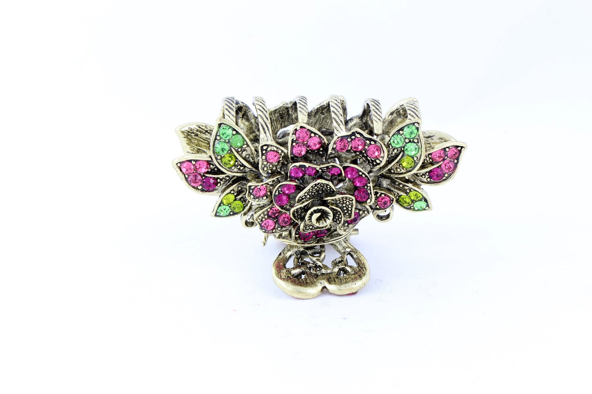 Antique bronze finish hair claw clip on a rose with pink stone petals