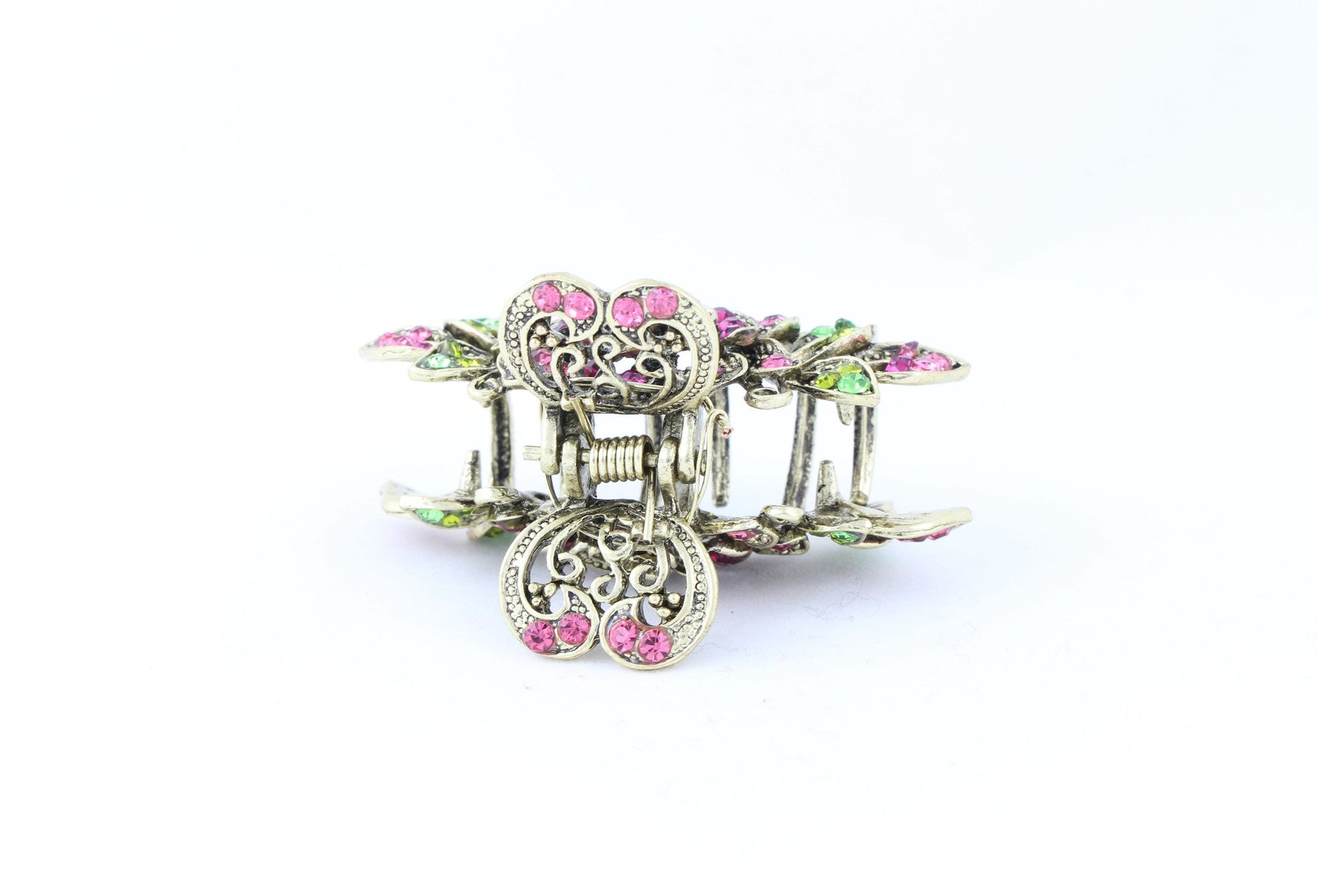 Antique bronze finish hair claw clip on a rose with pink stone petals