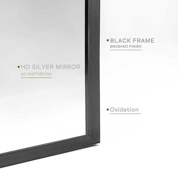 Close-up of 24x36 Inch Black Metal Framed Arched Wall Mirror highlighting its brushed black frame, HD silver mirror, and oxidation-resistant finish.