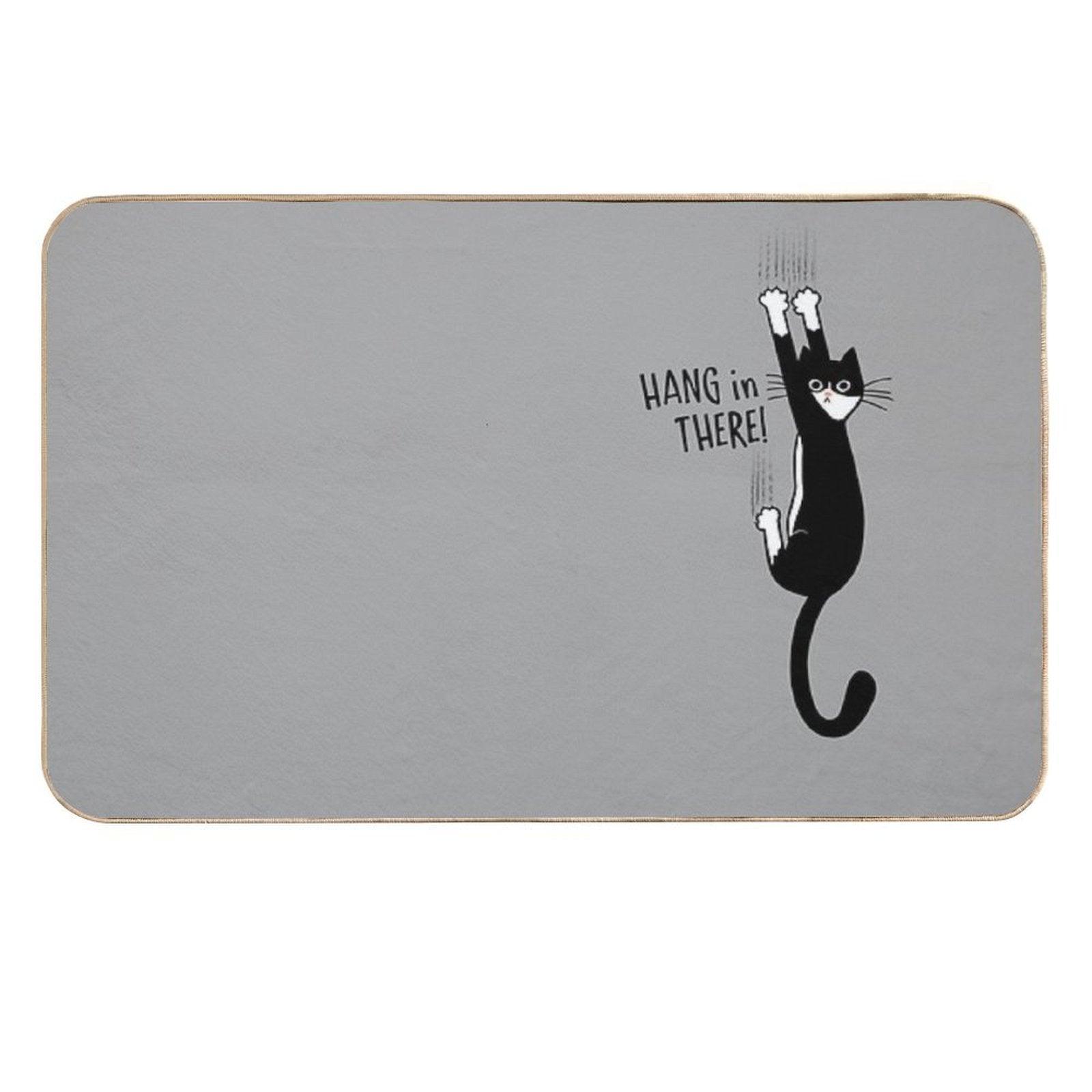 Tuxedo Cat Hanging On Hang In There! Funny Cat Hanging On With Claws  Long-Lasting Bath Mat