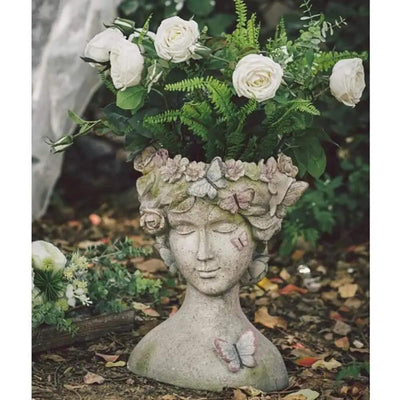 RESIN YOUNG GIRL PLANTER WITH COLORFUL BUTTERFLY