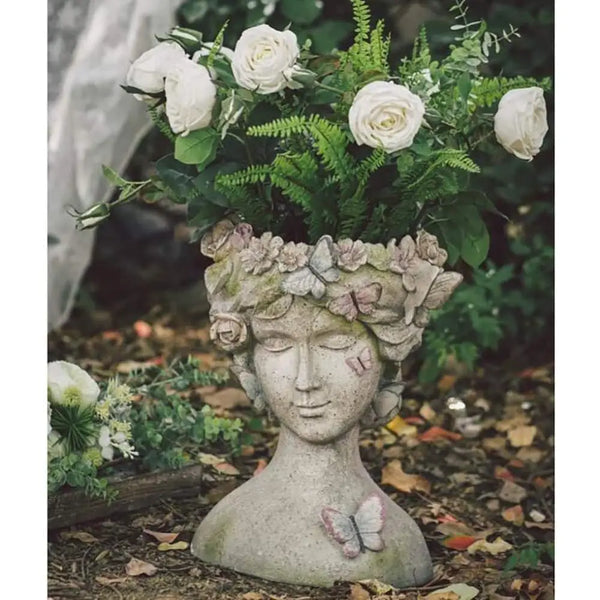 RESIN YOUNG GIRL PLANTER WITH COLORFUL BUTTERFLY