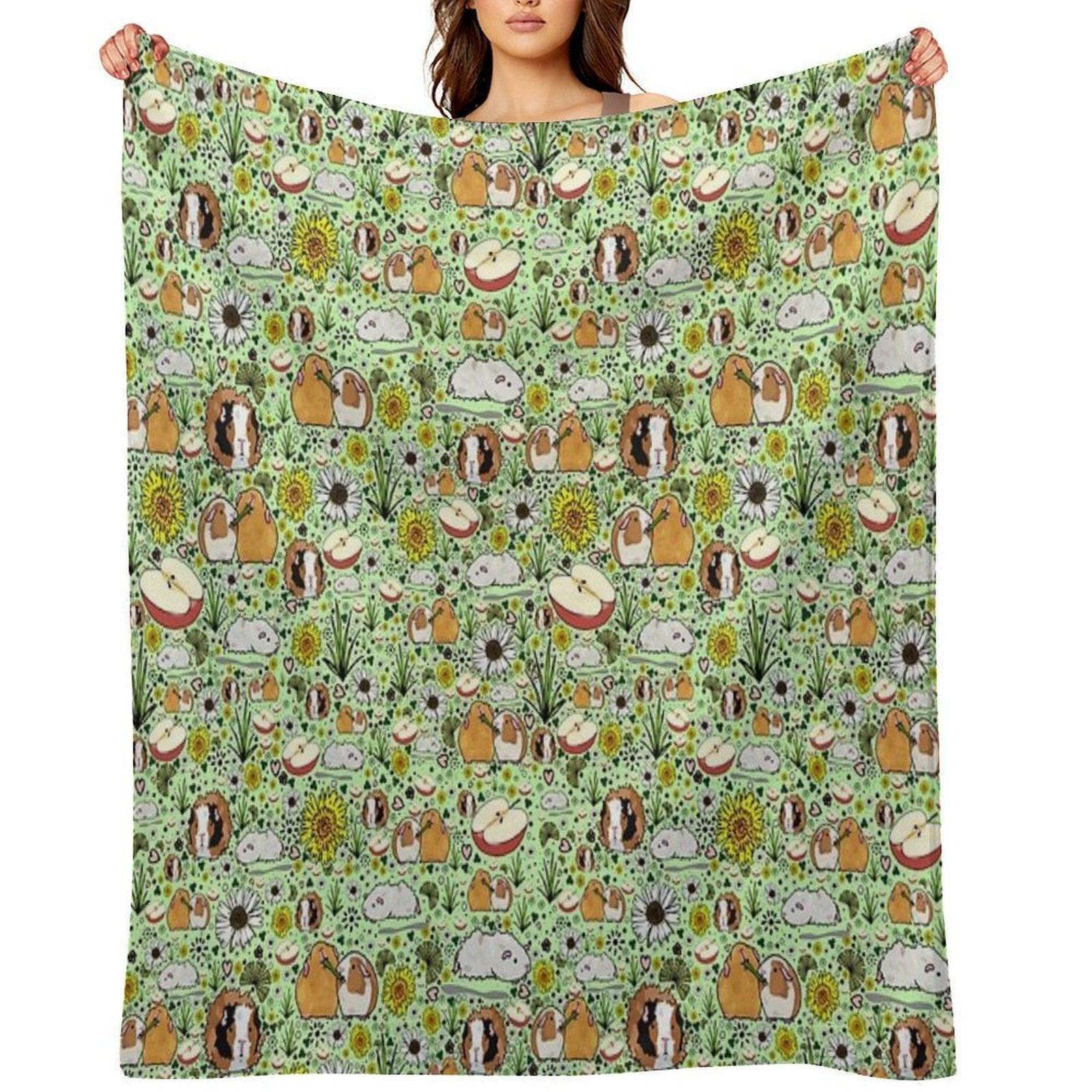 Guinea Pigs in Green Throw Blanket